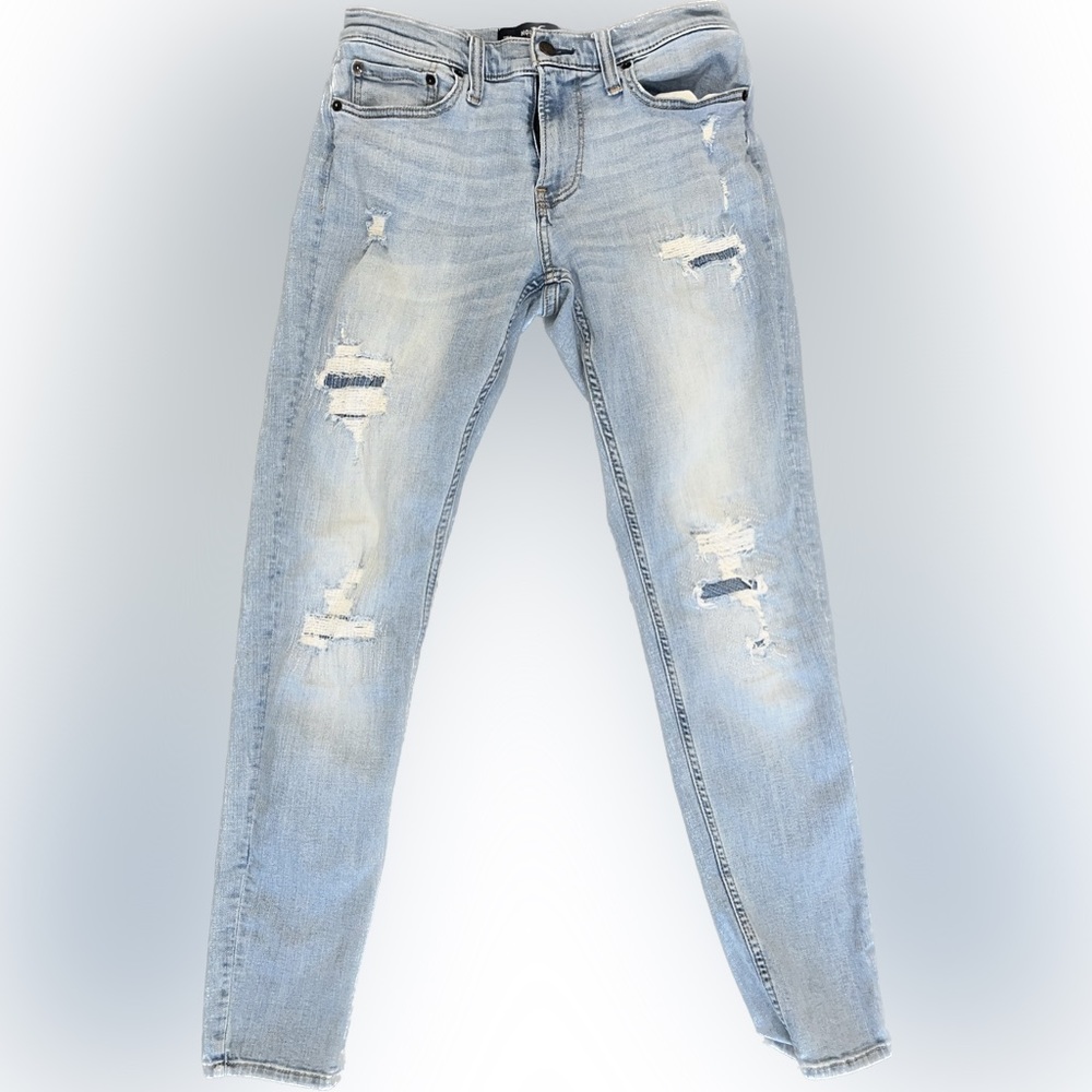 Hollister light wash men’s skinny Jean with patches.